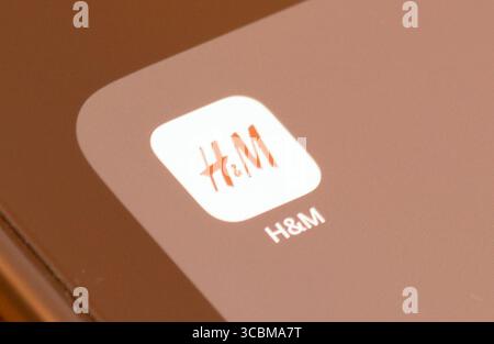 App moda H&M sullo schermo di uno smartphone Foto Stock