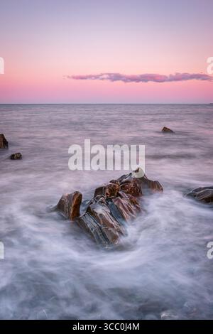 Tramonto sulla baia di Dundalk, Annagassan, Louth, Repubblica d'Irlanda Foto Stock