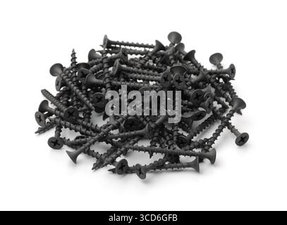 Pile di viti per cartongesso nere isolate su bianco Foto Stock