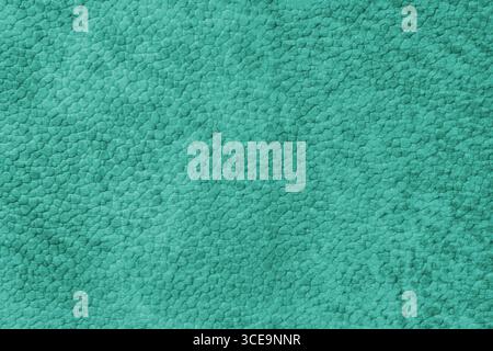 Primo piano dettagliato, texture in pelle scamosciata sintetica turchese, ecopelle e similpelle. Sfondo per design, moda, materiali per tappezzeria Foto Stock