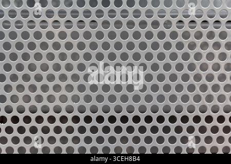 Primo piano della griglia del radiatore dell'auto. Sfondo e trama Foto Stock