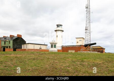 Faro di Heugh e Sebastopol Cannon, Hartlepool Headland, contea di Durham, Inghilterra, Regno Unito Foto Stock