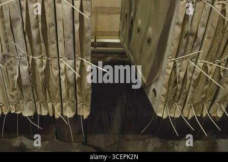 pannelli dissipatori di calore realizzati in lana di pietra e tessuto di amianto. Foto Stock