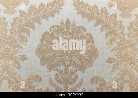 Damasco classico in stile vittoriano rococò in morbido beige, sfondo decorato con texture per tappezzeria Foto Stock