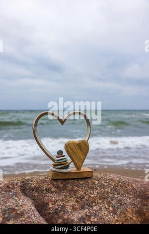 Cuori, cairn, decorazioni, a forma di cuore, costa del Mar Baltico Foto Stock