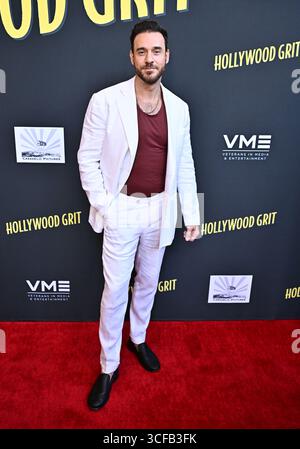 Los Angeles, Stati Uniti. 21 agosto 2025. Ryan Curtis arriva alla prima di "Hollywood Grit" tenutasi all'AMC The Grove 14 il 21 agosto 2025 a Los Angeles, CA. © Starbuck/ Credit: AFF/Alamy Live News Foto Stock