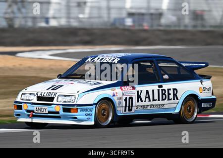 Circuito di Silverstone, Northamptonshire, Regno Unito. 24 agosto 2025; circuito di Silverstone, Northamptonshire, Inghilterra; 2025 Silverstone Festival Day 3; Julian THOMAS in una Ford Sierra Cosworth RS500 durante l'Adrian Flux Trophy per MRL Historic Touring Car Challenge Foto Stock