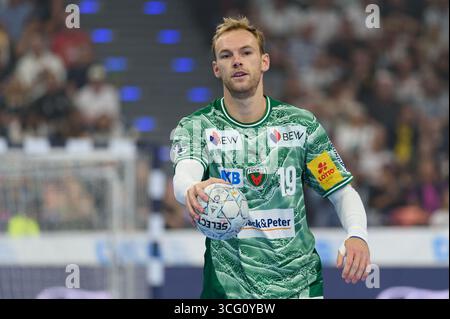 Monaco di Baviera, Germania. 23 agosto 2025. Monaco di Baviera, Germania, 23 agosto 2025: Mathias Gidsel (19 Füchse Berlino) durante la partita DHB Supercup tra Füchse Berlino e THW Kiel, SAP Garden, Monaco di Baviera, Germania. (Sven Beyrich/SPP) credito: SPP Sport Press Photo. /Alamy Live News Foto Stock