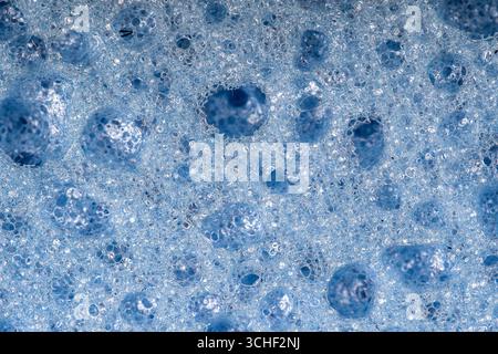 Spugna dettaglio texture, tessitura spugna close up sfondo. La Cellulosa Blu texture in spugna Foto Stock