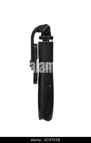 Un elegante mini treppiede ripiegato nero con supporto per telefono. Foto Stock