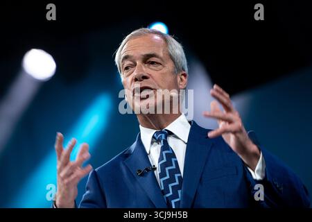 Nigel Farage, leader del Reform UK, parla alla conferenza annuale del partito al NEC di Birmingham, 5 settembre 2025. Foto Stock