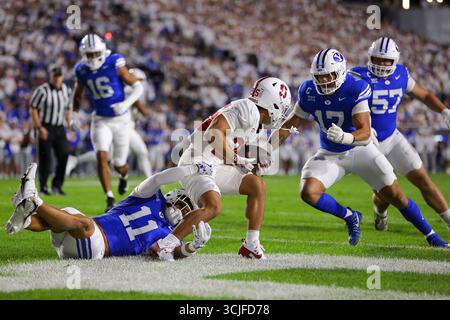 6 settembre 2025, Provo, Utah, USA: Il wide receiver di Stanford Cardinal MARCUS BROWN (25) viene placcato da Brigham Young Cougars, FALETAU SATUALA (11) e JACK KELLY (17) per una safety durante la prima metà della partita di football NCAA tra gli Stanford Cardinal e i BYU Cougars al LaVell Edwards Stadium. BYU ha vinto 27:3. (Credit Image: © Darrin Fry/ZUMA Press Wire) SOLO PER USO EDITORIALE! Non per USO commerciale! Crediti: ZUMA Press, Inc./Alamy Live News Foto Stock