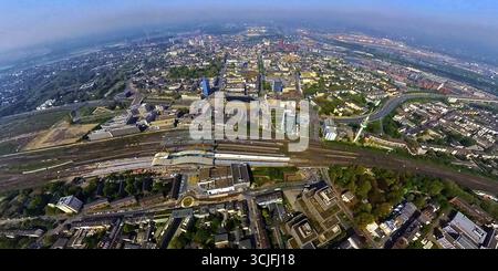 Vista aerea, stazione centrale Hbf Deutsche Bahn AG, principale cantiere, atrio e piazzale est della stazione principale, vista sul centro città, Dellviertel Foto Stock