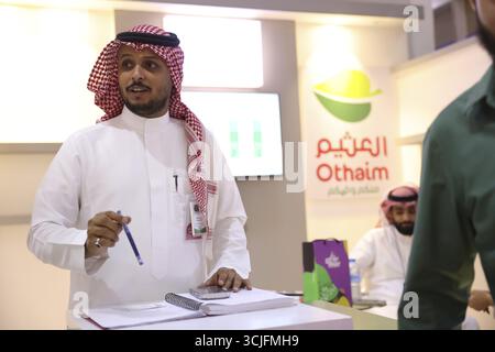 Le aziende saudite espongono prodotti e investimenti all'interno del padiglione saudita alla Fiera Internazionale di Damasco, la prima edizione dopo la caduta di Ba Foto Stock