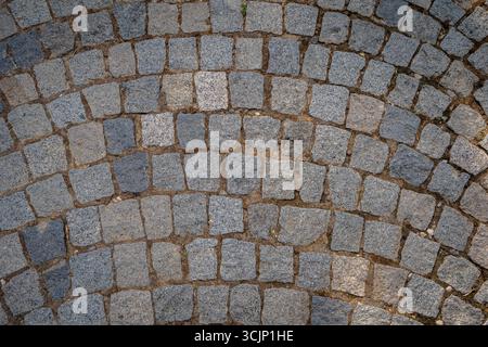 Primo piano dell'antica pavimentazione in pietra in Grecia Foto Stock