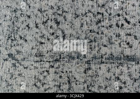 Grunge sfondo grigio metallo o texture con graffi e crepe, primo piano, vista dall'alto Foto Stock