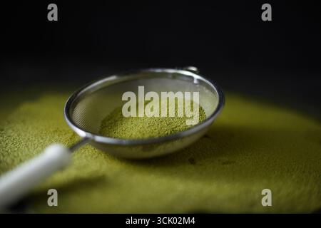 Primo piano della polvere di tè verde giapponese Foto Stock