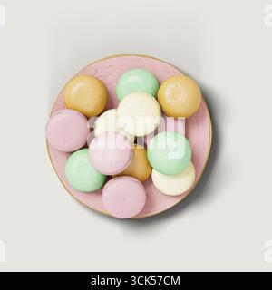 Un variopinto assortimento di macaron disposti in una ciotola rosa, che presenta una varietà di colori pastello. Foto Stock