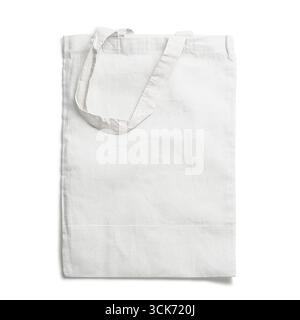 Una semplice borsa tote bianca in tessuto, ideale per lo shopping o il trasporto di oggetti personali. Foto Stock