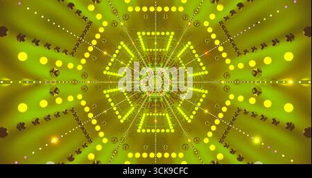 Un'accattivante esposizione di motivi geometrici con tonalità gialle e verdi brillanti che si irradiano da un punto centrale. Il design complesso crea un sens Foto Stock