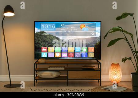 TV in camera. Menu con icone e informazioni sul display Foto Stock