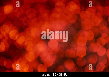 luce rossa sfocata della decorazione sfondo chiaro e texture Foto Stock