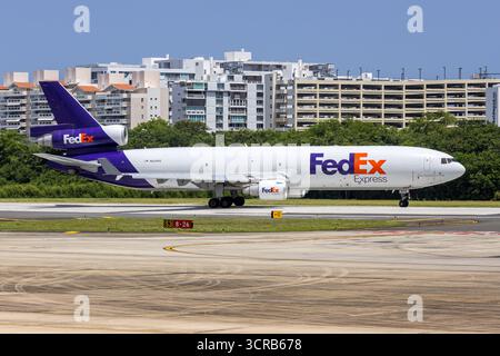 San Juan, Porto Rico - 4 agosto 2025: FedEx Express McDonnell Douglas MD-11(F) aeroplano presso l'aeroporto San Juan di Porto Rico. Foto Stock