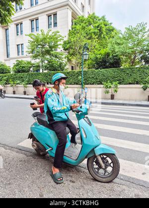 Vietnam, Hanoi, Vinfast moto taxi Foto Stock