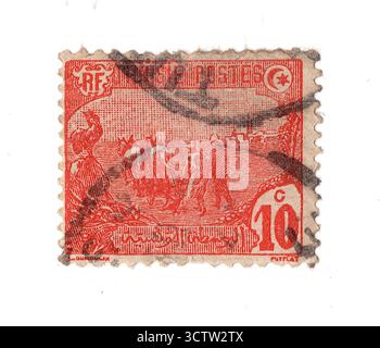 Un francobollo vintage dalla Tunisia isolato su sfondo bianco. Foto Stock