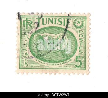 Un francobollo vintage dalla Tunisia isolato su sfondo bianco. Foto Stock