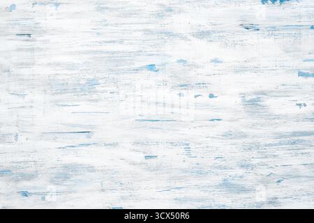 Sfondo in legno verniciato di bianco e blu chiaro con tratti di pennello, stile rustico, spazio copia Foto Stock