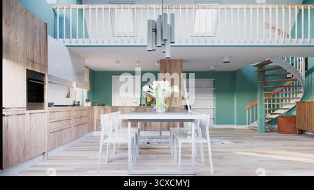 L'interno di una moderna casa open-space con zona pranzo, cucina e un soppalco con scala a chiocciola. Foto Stock