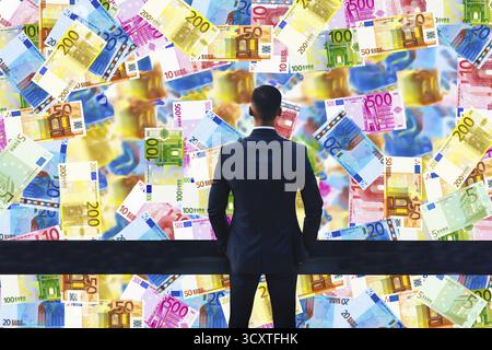 Foto Symbol, manager con euro, economia finanziaria, borsa valori, banche, flussi monetari, svalutazione, politica dell’euro, inflazione, stagnazione, profitti, capita Foto Stock