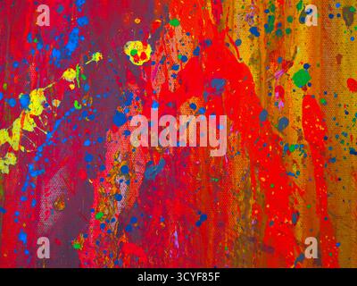 Astratto di colori vivaci sparsi sulla tela Foto Stock