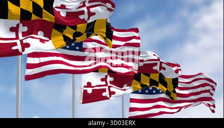 Bandiera dello stato del Maryland che sventolava nel vento con la bandiera nazionale americana in una giornata limpida. rendering illustrazione 3d. Tessuto ondulato. Messa a fuoco selettiva Foto Stock