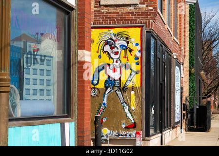 Chicago, Illinois - Stati Uniti - 6 aprile 2025: Il Paul Kostabi Mural sul David Leonardis Galleries Building nel quartiere di Wicker Park Foto Stock