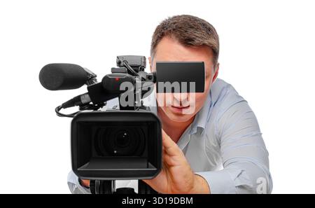 Un cameraman professionista che utilizza una videocamera Foto Stock
