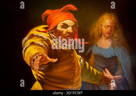 Potente opera d'arte rinascimentale che mostra un giullare che difende una donna dolorosa con colori vivaci, espressione emotiva e forte illuminazione scenica. Foto Stock