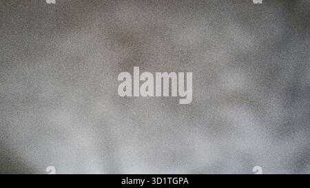 Questo sfondo testurizzato presenta un effetto sfocato e sfocato, perfetto per aggiungere profondità e interesse visivo ai progetti Foto Stock
