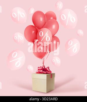 Sconto. Palloncini con cartelli percentuali e confezione regalo su sfondo rosa Foto Stock