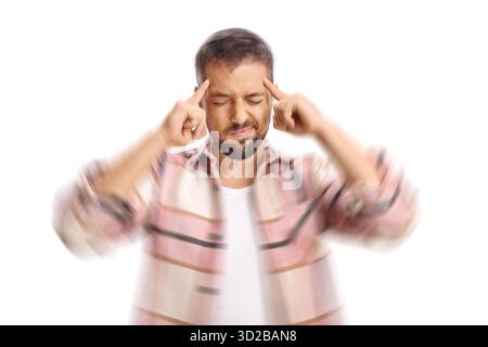 Giovane uomo che soffre di mal di testa e vertigini Foto Stock