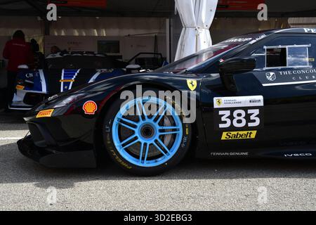 Scarperia, Italia - 24 ottobre 2025: Ferrari 296 Challenge nel paddock durante le finali del mondo Ferrari 2025 sul circuito del Mugello in Italia. Foto Stock