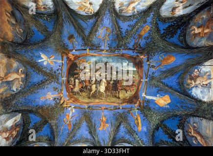 DOSSI, Dosso (nato ca. 1490, Ferrara, d. 1542, Ferrara) Francesco Maria della Rovere conduce le sue Troups 1530 affresco camera delle Cariatidi, Villa Imperiale, la soluzione di Pesaro Raffaello per la decorazione del soffitto, allungando un velario, o tenda, attraverso l'apertura illusoria del soffitto e usandolo come supporto autonomo per il dipinto, trovò applicazione diffusa. Soluzioni analoghe si trovano in opere successive, come nella Villa Imperiale. L'immagine mostra il pannello a soffitto della camera delle Cariatidi nella Villa Imperiale. --- parole chiave: --------------- Autore: DOSSI, Dosso Titl Foto Stock