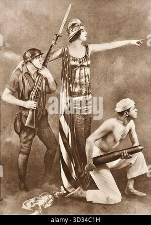 Ben Ali Haggin - ritrattista e scenografo americano. Era noto per i suoi ritratti di importanti donne della società e interpreti teatrali, e per aver progettato "tableaux vivants" (immagini viventi) per le Ziegfeld Follies dal 1917 al 1925. L'immagine fornita è una fotografia di uno di questi tableau patriottico, intitolato America Answers, che è stato organizzato da Haggin. Presenta l'attrice Ethel Barrymore come la figura centrale che rappresenta la libertà. Questo particolare tableau faceva parte di una serie utilizzata per la propaganda o per la raccolta di fondi, come il National Red Cross Pageant nel 1917 e il Liberty Loan Foto Stock
