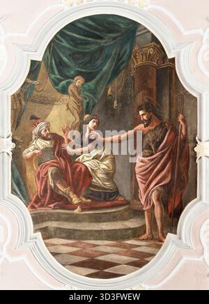 Bad Reichenhall - l'affresco di San Giovanni Battista denuncia di Erode ed Erodia nella chiesa di San Giovanni Spitalkirche Foto Stock