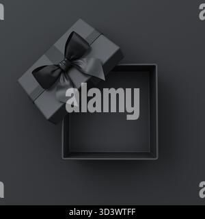 Scatola regalo nera vuota aperta o vista dall'alto della scatola regalo nera con nastri neri e arco isolato su sfondo scuro con ombre minime di truffa nera venerdì Foto Stock