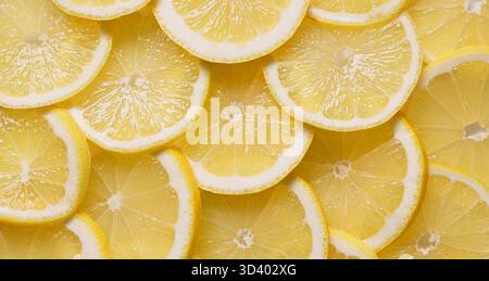 primo piano di fette di frutta al limone mature e succose, sfondo alimentare Foto Stock