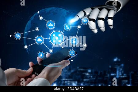 L'immagine evidenzia l'interazione tra una mano umana con uno smartphone e una mano robotica, simboleggiando la combinazione di tecnologia e umanità in un Foto Stock