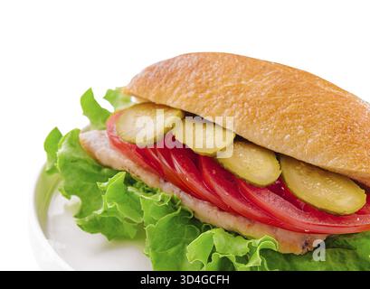 Cibo, sandwich con cotoletta, pomodori e cetrioli sottaceto Foto Stock