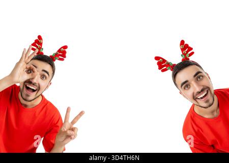 Giovane che mostra gesti divertenti indossando corna di renna, isolato, png Foto Stock